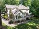 Charming home with a large deck, sunroom, and beautifully landscaped yard at 4673 Jefferson Township Pl, Marietta, GA 30066