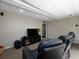 Cozy media room featuring comfortable seating, recessed lighting, and home theater setup at 4673 Jefferson Township Pl, Marietta, GA 30066