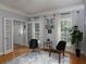 Cozy sitting room with natural light, modern furniture, and hardwood flooring at 4673 Jefferson Township Pl, Marietta, GA 30066