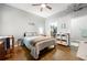 This bedroom has a ceiling fan and an ensuite bathroom with walk-in closet at 5300 Peachtree Rd # 105, Atlanta, GA 30341