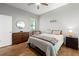 Bright bedroom with a ceiling fan and a large window that allows a lot of natural light at 5300 Peachtree Rd # 105, Atlanta, GA 30341