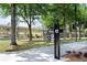 Rail trail sign with trail in background surrounded by lush trees and green landscaping at 5300 Peachtree Rd # 105, Atlanta, GA 30341