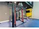 Gym featuring weight-lifting equipment, punching bag, and flat screen television at 5300 Peachtree Rd # 105, Atlanta, GA 30341