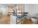 Modern kitchen featuring a stylish bar, stainless steel appliances, and sleek countertops at 5300 Peachtree Rd # 105, Atlanta, GA 30341