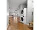 Laundry room with modern stacked washer and dryer, offering convenience and space-saving design at 5300 Peachtree Rd # 105, Atlanta, GA 30341