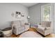 Cozy living room with comfortable seating and charming decor, creating a warm and inviting atmosphere at 5300 Peachtree Rd # 105, Atlanta, GA 30341