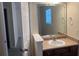 Bathroom vanity with a large mirror and modern fixtures at 7055 Blairs View Dr # 1, Austell, GA 30168