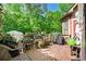 Spacious back deck with plenty of room for seating and grilling, surrounded by lush greenery at 931 Windsor Creek Dr, Grayson, GA 30017