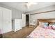 Bedroom with natural light, dresser, and decorative accents at 931 Windsor Creek Dr, Grayson, GA 30017