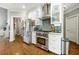 Well-equipped kitchen with stainless steel appliances, granite countertops, and plenty of cabinet space at 931 Windsor Creek Dr, Grayson, GA 30017