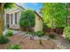 Side view of the stone and siding exterior showcasing the landscaped yard at 931 Windsor Creek Dr, Grayson, GA 30017
