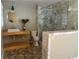 Modern bathroom with sleek vanity, marble shower, and stylish fixtures at 1053 Allgood Rd, Stone Mountain, GA 30083