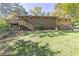 The home's brick exterior features a large backyard with a new wooden deck at 255 Shipp Cir, Hiram, GA 30141