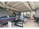 Spacious basement area featuring an open ceiling, a bed, desk and sitting area at 255 Shipp Cir, Hiram, GA 30141