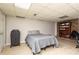 Spacious basement bedroom featuring a brick accent wall and ample storage and shelf space at 255 Shipp Cir, Hiram, GA 30141