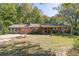 Charming single-story home with covered front porch and well-maintained lawn at 255 Shipp Cir, Hiram, GA 30141