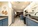 Modern kitchen with stainless steel appliances and an open layout overlooking the living room at 255 Shipp Cir, Hiram, GA 30141