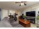 Open concept living space with view to the kitchen and hardwood floors throughout at 255 Shipp Cir, Hiram, GA 30141