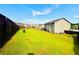 The spacious backyard offers endless possibilities for outdoor enjoyment and entertainment at 2579 Wimberley Pine Ct, Dacula, GA 30019