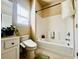 Clean bathroom featuring a bathtub, toilet, and vanity with storage perfect for everyday needs at 2579 Wimberley Pine Ct, Dacula, GA 30019