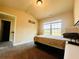 This bedroom features neutral walls, carpet, and ample natural light at 2579 Wimberley Pine Ct, Dacula, GA 30019