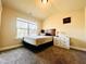 This bedroom features neutral walls, carpet, and ample natural light at 2579 Wimberley Pine Ct, Dacula, GA 30019