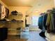 Walk-in closet featuring wire shelving and carpet flooring provides ample space for storage at 2579 Wimberley Pine Ct, Dacula, GA 30019