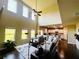 Bright, open floor plan with living room, kitchen, and large windows overlooking backyard at 2579 Wimberley Pine Ct, Dacula, GA 30019