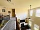A loft view of the living room boasting high ceilings, a cozy fireplace, and bright natural light at 2579 Wimberley Pine Ct, Dacula, GA 30019