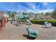 Community playground with slides, swings, and seating areas at 3485 Walnut Rdg, Atlanta, GA 30349