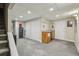 Finished basement featuring carpeting, bar area and plenty of storage at 3715 Borning Ct, Johns Creek, GA 30022