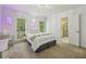 Bedroom featuring a white color scheme and views to the backyard at 3715 Borning Ct, Johns Creek, GA 30022