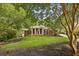 Beautifully landscaped front yard with a well-manicured lawn and inviting entrance, enhancing the curb appeal of this lovely home at 3715 Borning Ct, Johns Creek, GA 30022