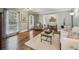 Bright living room featuring hardwood floors, natural light, and stylish furniture at 3715 Borning Ct, Johns Creek, GA 30022
