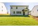 Two story home with a large, well-maintained backyard at 129 Henley St, Canton, GA 30114