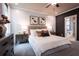 Beautiful bedroom with a plush bed, elegant decor, and an ensuite bathroom view at 129 Henley St, Canton, GA 30114