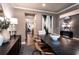 Well decorated dining area with an opening into another room at 129 Henley St, Canton, GA 30114