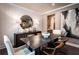 Stylish dining room with a dark wood table, modern chairs, and elegant decor at 129 Henley St, Canton, GA 30114