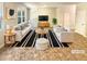 Staged living room with bright natural light, contemporary furniture, and decor at 1958 Millstream Holw, Conyers, GA 30012