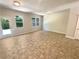 Bright living room with large windows and a door to the outside at 1958 Millstream Holw, Conyers, GA 30012