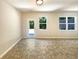 Bright living room with a glass door and large windows at 1958 Millstream Holw, Conyers, GA 30012