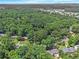 Secluded property amidst mature trees offering privacy and natural beauty at 6590 Williamson Ne Dr, Atlanta, GA 30328