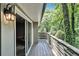 Private balcony overlooks a lush green wooded area for enjoying nature's peace at 6590 Williamson Ne Dr, Atlanta, GA 30328