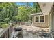 Outdoor deck featuring lounge seating and a dining set, perfect for relaxing and entertaining at 6590 Williamson Ne Dr, Atlanta, GA 30328