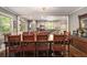 Dining room open to the kitchen, featuring stylish decor, modern appliances, and natural light at 6590 Williamson Ne Dr, Atlanta, GA 30328