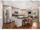Bright kitchen with stainless steel appliances, a center island, and modern finishes at 6590 Williamson Ne Dr, Atlanta, GA 30328
