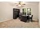 Bright office space with a large window, neutral carpet and desk at 6590 Williamson Ne Dr, Atlanta, GA 30328