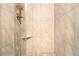 Contemporary shower showcases white marble-style tile and modern fixtures at 6590 Williamson Ne Dr, Atlanta, GA 30328