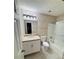Full bathroom featuring granite counters, tiled shower, and modern fixtures at 6832 Shangrila Way, Riverdale, GA 30296