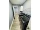 Convenient laundry room equipped with new washer and dryer at 6832 Shangrila Way, Riverdale, GA 30296